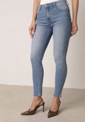 Niebieskie Dopasowane Jeansy z Bawełną z Efektem Push-Up Eriflare. Niebieskie jeansy Born2be, l, bez wzorów, z bawełny, klasyczne. Za 89.99 zł.