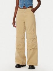 HUGO Spodnie materiałowe Hunder 50530833 Beżowy Relaxed Fit. Brązowe spodnie materiałowe Hugo, bez wzorów, z bawełny. Za 289.99 zł.