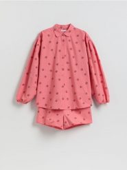 Dwuczęściowa piżama we wzory - intenstywna czerwień. Czerwone piżamy Reserved, l, bez wzorów, z bawełny, bez kołnierzyka, bez ramiączek. Za 149.99 zł.