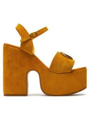 Guess Sandały Clody FLJCLO SUE04 Żółty. Żółte sandały Guess, z aplikacjami, ze skóry, bez obcasa, na słupku, bez zapięcia. Za 619.99 zł.