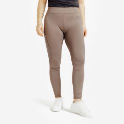 Legginsy jeździeckie damskie ciepłe z silikonowym lejem. Czarne legginsy FOUGANZA, bez wzorów, z materiału, długie. Za 199.99 zł.