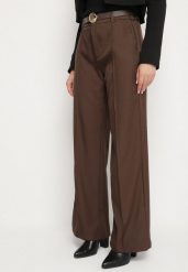 Brązowe Garniturowe Spodnie o Szerokim Kroju z Paskiem ze Sprzączką Muszelką Saliavia. Brązowe jeansy Born2be, s, bez wzorów, z jeansu, eleganckie. Za 109.99 zł.
