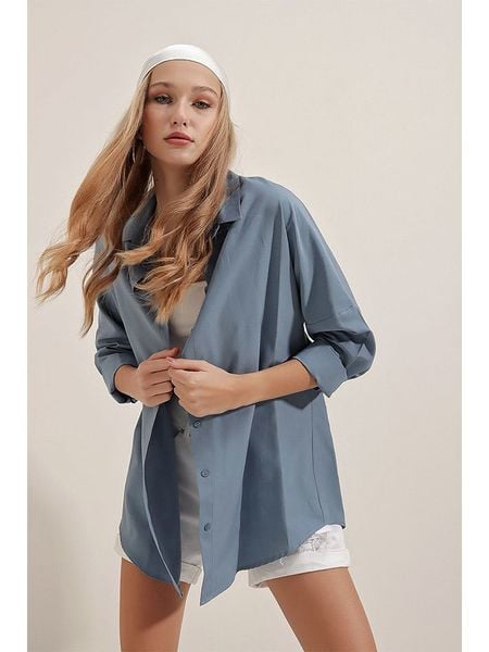 Trendyol Koszula w kolorze niebieskim rozmiar: 40. Niebieskie koszule Trendyol, bez wzorów, z bawełny, bez kołnierzyka, bez ramiączek. Za 57.06 zł.