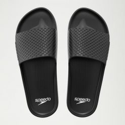 Klapki basenowe antypoślizgowe damskie Speedo Slide Entry. Czarne klapki Speedo, bez wzorów, z materiału, bez obcasa, bez zapięcia. Za 63.99 zł.