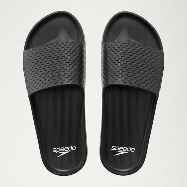 Klapki basenowe antypoślizgowe damskie Speedo Slide Entry. Czarne klapki Speedo, bez wzorów, z materiału, bez obcasa, bez zapięcia. Za 66.99 zł.