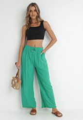 Zielone Spodnie Sharrill. Zielone jeansy Born2be, l, z aplikacjami, z jeansu, eleganckie, długie. W wyprzedaży za 33.99 zł.