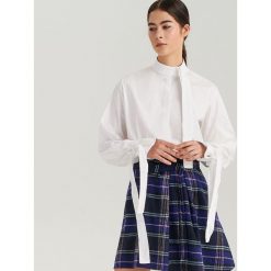 Biała koszula oversize ReDesign - Kremowy. Koszule marki DOMYOS. W wyprzedaży za 79.99 zł.
