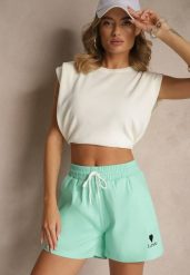 Jasnozielone Klasyczne Szorty Dresowe z Kieszeniami Wiązane w Pasie Folenelle. Zielone szorty Renee, bez wzorów, z dresówki, eleganckie. W wyprzedaży za 39.99 zł.