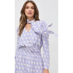 Twinset sukienka kolor fioletowy mini rozkloszowana. Fioletowe sukienki Twinset, l, bez wzorów, bez kołnierzyka, bez ramiączek, mini, rozkloszowane. W wyprzedaży za 559.99 zł.