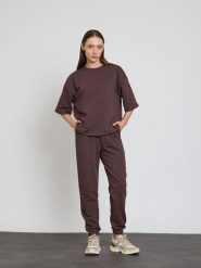 BGN Spodnie dresowe w kolorze brązowym rozmiar: 38. Brązowe spodnie dresowe BGN, bez wzorów, z dresówki. Za 108.99 zł.