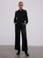 BGN Spodnie w kolorze czarnym rozmiar: 34. Czarne spodnie materiałowe BGN, bez wzorów, z materiału. Za 131.12 zł.