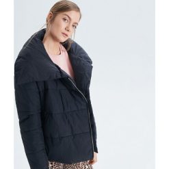 Pikowana kurtka z kołnierzem - Czarny. Kurtki marki QUECHUA. Za 189.99 zł.