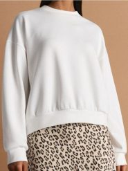 Gładka bluza z długim rękawem soft touch - kremowy. Białe bluzy Sinsay, l, bez wzorów, bez kaptura. Za 49.99 zł.