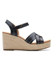 Clarks Skórzane sandały "Sabina Strap" w kolorze czarnym na koturnie rozmiar: 40. Czarne sandały Clarks, bez wzorów, z otwartym noskiem, bez obcasa, na koturnie, bez zapięcia. Za 203.45 zł.