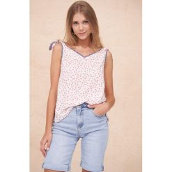 Bluzka Damska Omnires BS Groszki Róż / Kwiaty. Czerwone bluzki blue shadow, bez wzorów, bez kołnierzyka, bez ramiączek. Za 149.90 zł.
