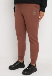 Ciemnobrązowe Klasyczne Spodnie Dresowe o Kroju Joggerów Lerive. Brązowe jeansy Born2be, xl, bez wzorów, z dresówki, biznesowe. Za 69.99 zł.