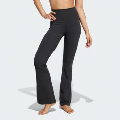 Legginsy All Me Flare. Czarne legginsy adidas, bez wzorów, eleganckie. Za 279.00 zł.