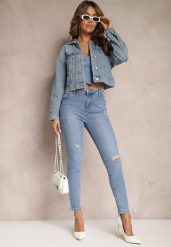 Niebieskie Jeansy z Dziurami i Przetarciami o Fasonie Skinny Klifana. Niebieskie jeansy Renee, bez wzorów, z jeansu, rockowe. W wyprzedaży za 99.99 zł.