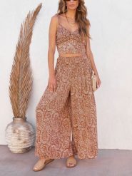 Milan Kiss Spodnie w kolorze jasnobrązowym rozmiar: L. Brązowe spodnie materiałowe Milan Kiss, bez wzorów, z materiału. Za 130.99 zł.