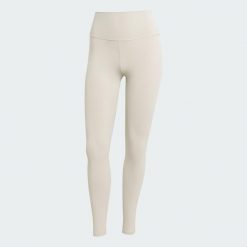 Legginsy All Me 7/8. Brązowe legginsy adidas, bez wzorów, z elastanu. Za 234.40 zł.