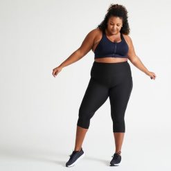 Legginsy fitness damskie Domyos 7/8. Czarne legginsy DOMYOS, bez wzorów, z materiału, sportowe, długie. Za 79.99 zł.