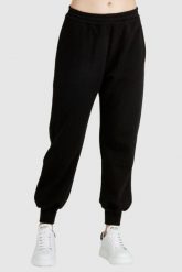 ALEXANDER MCQUEEN Czarne dresowe spodnie damskie. Czarne spodnie dresowe alexander mcqueen, bez wzorów, z bawełny. W wyprzedaży za 999.99 zł.
