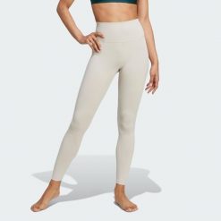 Legginsy All Me 7/8. Brązowe legginsy adidas, bez wzorów, z materiału, sportowe. Za 279.00 zł.