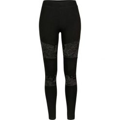 Damskie legginsy urban classic z wstawkami z koronki. Czarne legginsy Urban Classics, bez wzorów, z koronki. Za 105.90 zł.