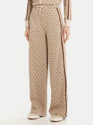 Guess Spodnie dresowe V5RB03 KCO90 Beżowy Regular Fit. Brązowe spodnie dresowe Guess, z aplikacjami, z dresówki. Za 399.99 zł.