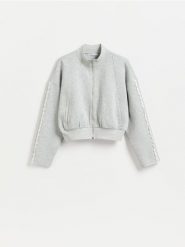 Bluza z ażurowymi wstawkami - jasnoszary. Szare bluzy bez kaptura Reserved, l, w ażurowe wzory, z bawełny, bez kaptura. Za 99.99 zł.