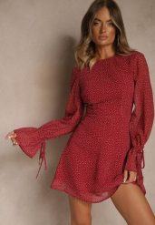 Bordowa Sukienka Vices Ozdobiona Transparentnymi Rękawami i Kropkami Celziva. Czerwone sukienki Renee, na co dzień, l, bez wzorów, z koronki, eleganckie, bez kołnierzyka, bez ramiączek, mini, dopasowane. Za 99.99 zł.