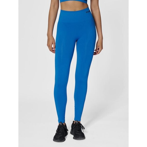 Damskie legginsy bezszwowe z wysokim stanem Hummel Tif. Niebieskie legginsy Hummel, bez wzorów, z poliamidu, sportowe. Za 130.50 zł.
