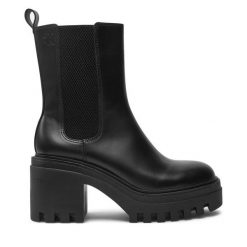 Botki Calvin Klein Jeans. Czarne botki Calvin Klein Jeans, bez wzorów, z jeansu, bez obcasa, na słupku, bez zapięcia. Za 469.99 zł.