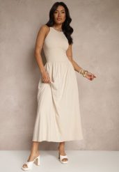 Jasnobeżowa Rozkloszowana Sukienka z Bawełny z Kieszeniami Lirevane. Brązowe sukienki Renee, na co dzień, l, bez wzorów, z bawełny, eleganckie, bez kołnierzyka, bez ramiączek, maxi, rozkloszowane. W wyprzedaży za 111.99 zł.
