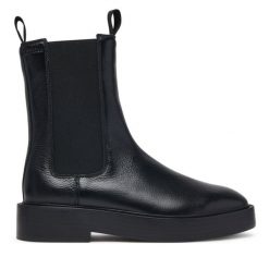 Sztyblety Calvin Klein. Czarne botki Calvin Klein, bez wzorów, bez obcasa, na płaskiej podeszwie, bez zapięcia. Za 849.99 zł.