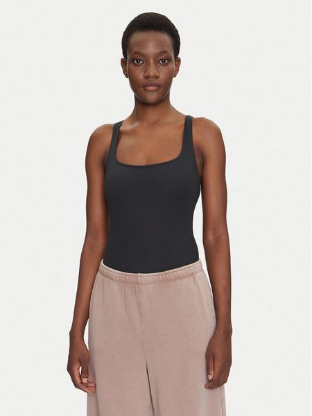 Girlfriend Collective Body Penny 5013 Czarny Slim Fit. Czarne body i gorsety GIRLFRIEND COLLECTIVE, bez wzorów, z syntetyku, bez ramiączek. Za 209.99 zł.