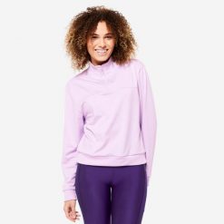 Bluza damska Domyos fitness. Czarne bluzy DOMYOS, l, bez wzorów, z elastanu, bez kaptura, na fitness i siłownię. Za 69.99 zł.