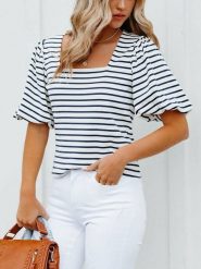 Milan Kiss Bluzka w kolorze białym rozmiar: L. Białe bluzki Milan Kiss, l, bez wzorów, bez kołnierzyka, bez ramiączek. Za 126.99 zł.