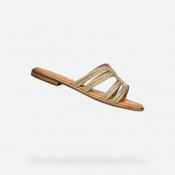 Sandały GEOX D SOZY PLUS Złoty. Żółte sandały Geox, bez wzorów, ze skóry, bez obcasa, bez zapięcia. Za 349.99 zł.