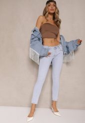 Jasnoniebieskie Jeansy o Kroju Skinny Low Waist Kolanilia. Niebieskie jeansy Renee, bez wzorów, z jeansu, eleganckie, z obniżonym stanem. W wyprzedaży za 68.99 zł.