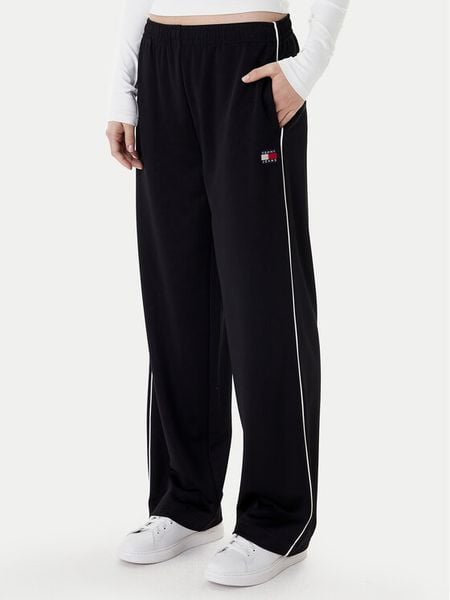 Tommy Jeans Spodnie dresowe Archive DW0DW22633 Czarny Regular Fit. Czarne spodnie sportowe Tommy Jeans, bez wzorów, z dresówki. Za 409.99 zł.