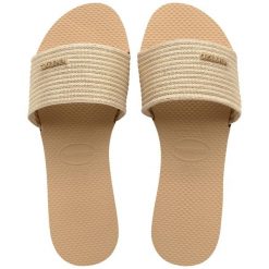 Klapki damskie Havaianas You Malta Metallic. Żółte klapki Havaianas, bez wzorów, sportowe, bez obcasa, bez zapięcia. Za 97.99 zł.