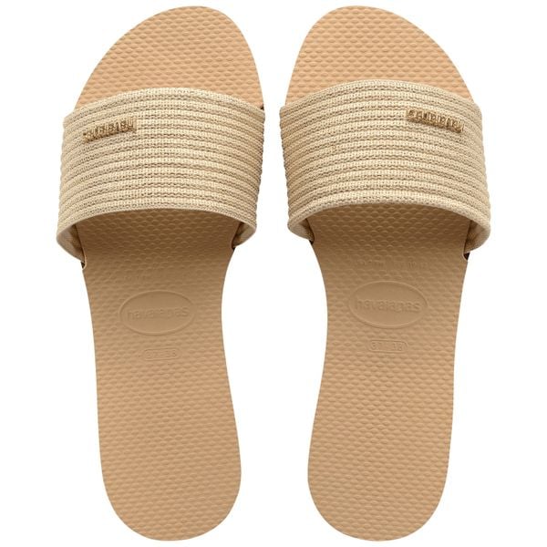 Klapki damskie Havaianas You Malta Metallic. Żółte klapki Havaianas, bez wzorów, bez obcasa, bez zapięcia. Za 97.99 zł.