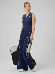 4F Spodnie dresowe z szerokimi nogawkami damskie - granatowe L. Niebieskie spodnie dresowe 4f, bez wzorów, z bawełny, długie. Za 159.99 zł.