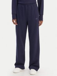 DKNY Sport Spodnie dresowe DP6P3795 Granatowy Regular Fit. Niebieskie spodnie dresowe DKNY Sport, bez wzorów, z bawełny. Za 309.99 zł.