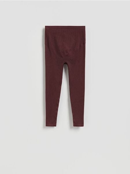 Bezszwowe legginsy - brązowy. Brązowe legginsy Reserved, bez wzorów, z dzianiny. Za 89.99 zł.