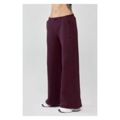 Damskie spodnie sportowe oversize Rough Radical Trip Joggers. Czerwone spodnie dresowe ROUGH RADICAL, bez wzorów, na jogę i pilates. Za 175.92 zł.