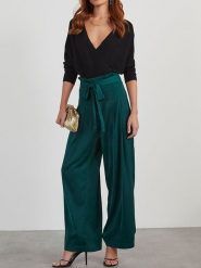 Milan Kiss Spodnie w kolorze morskim rozmiar: M. Niebieskie spodnie materiałowe Milan Kiss, bez wzorów, z materiału, z podwyższonym stanem. Za 152.99 zł.