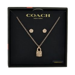 Zestaw naszyjnik i kolczyki Coach. Czerwone kolczyki Coach, złote. Za 599.99 zł.