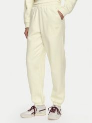 Reebok Spodnie dresowe Reebok x Ewa Chodakowska RK25981CCW Kremowy Regular Fit. Białe spodnie dresowe Reebok, bez wzorów, z dresówki. Za 179.99 zł.